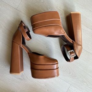 Brown platform fashion nova heels worn once, size 7.5